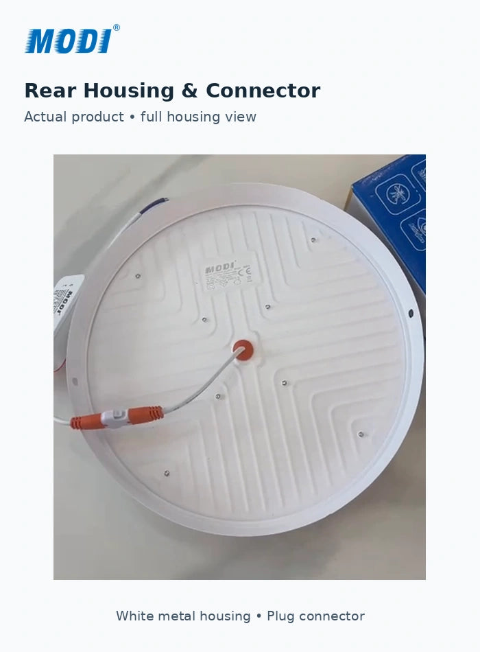 Actual video frame showing the complete circular rear housing of the LED ceiling light and its plug connector