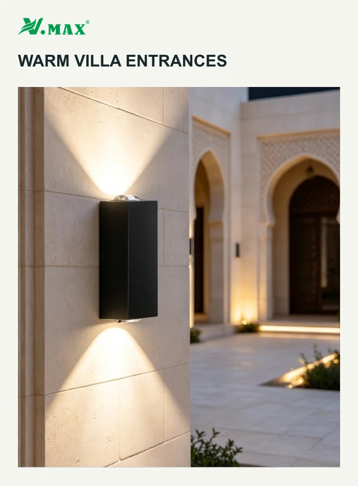 Manufacturer scene showing the black wall light on a stone wall beside an arched villa entrance