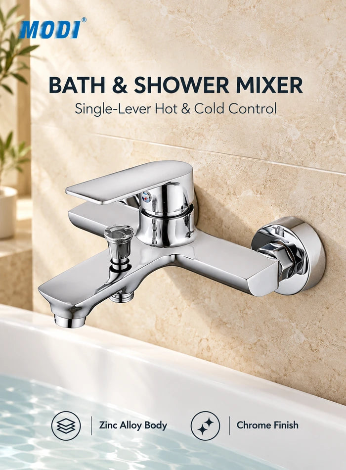 Chrome wall-mounted bath shower mixer with single-lever control and diverter above a bathtub