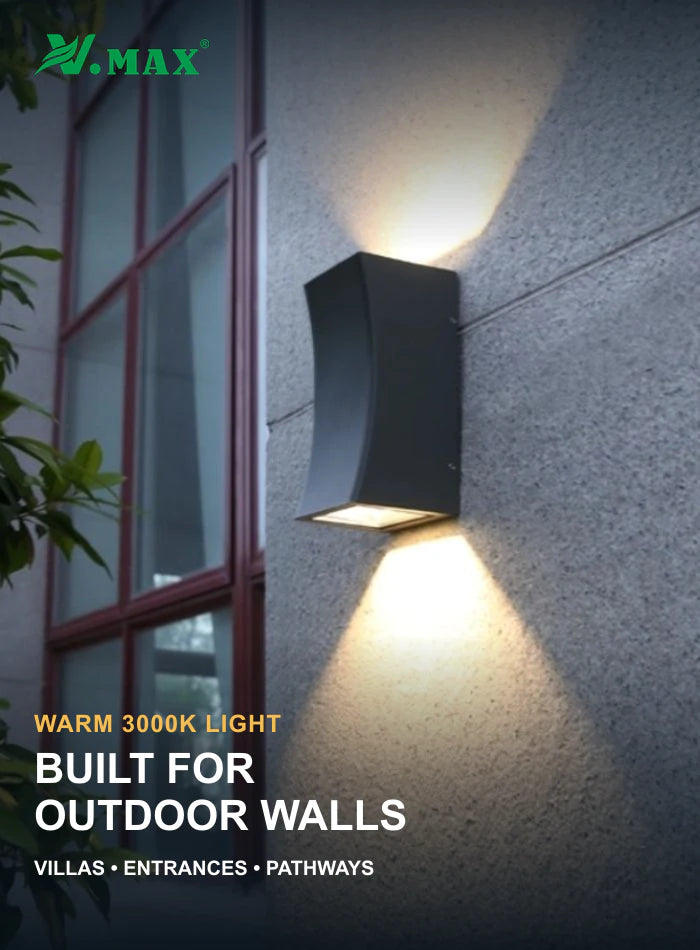 VMAX black outdoor wall light on a villa wall with warm up and down lighting