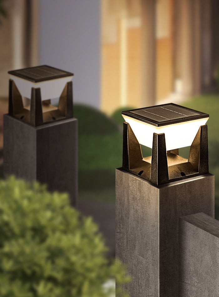 Solar pillar lights installed on villa gate pillars for outdoor lighting
