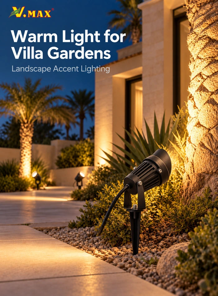 Warm white LED garden spike light aimed upward at a palm tree in a Kuwait-style villa garden